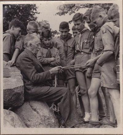 James “Dad” Drew teaches early Boy Scouts how to tie knots