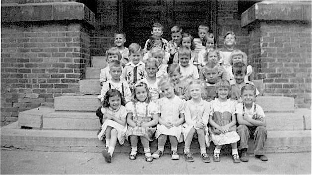 A kindergarten class in spring 1951. The writer is in the third row, second from left.