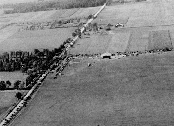 In a 1920 aerial view looking north, the Quinn farm can be seen at the top of the photo, on the east side of Snelling Avenue, then a two-lane gravel road. Curtiss Northwest Airport is directly to the south, across Larpenteur Avenue. Photo courtesy of the Minnesota Aviation Hall of Fame.