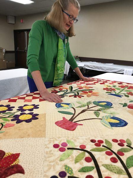 Kate Eelkema with quilt. Photo submitted by Kate Eelkema.