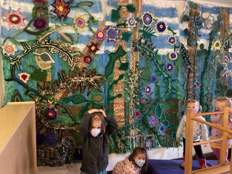 Students at the SAP Community Nursery School enjoy the art work called “The Jungle.” Photos by Sarah CR Clark.