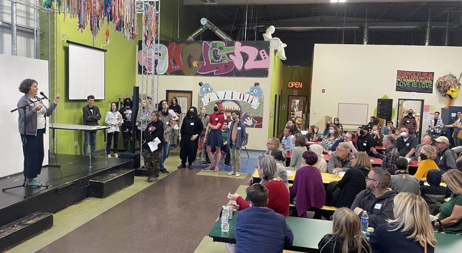 Avalon staff member Nora Whalen introduces the Senior Project at the school’s fall gathering on Oct. 6. Photo courtesy of Tim Quealy