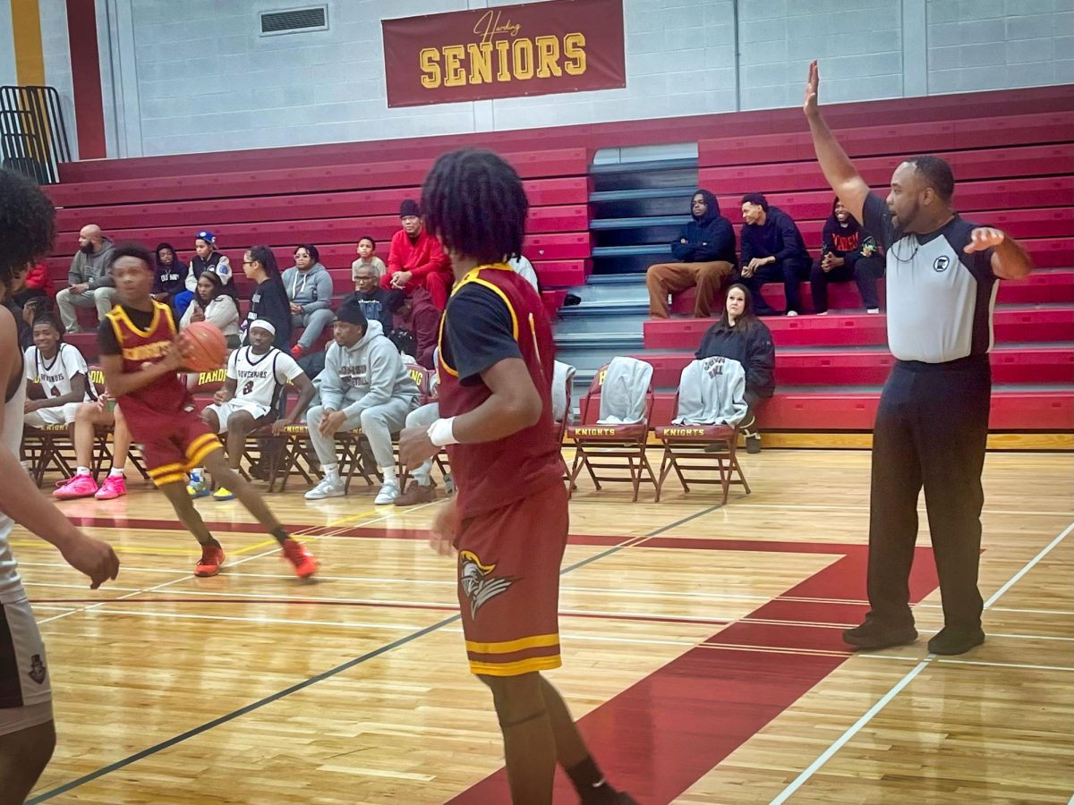 Saladin Broadway monitors an in-bound play on the baseline. Broadway appreciates giving back to the basketball community he grew up in. 