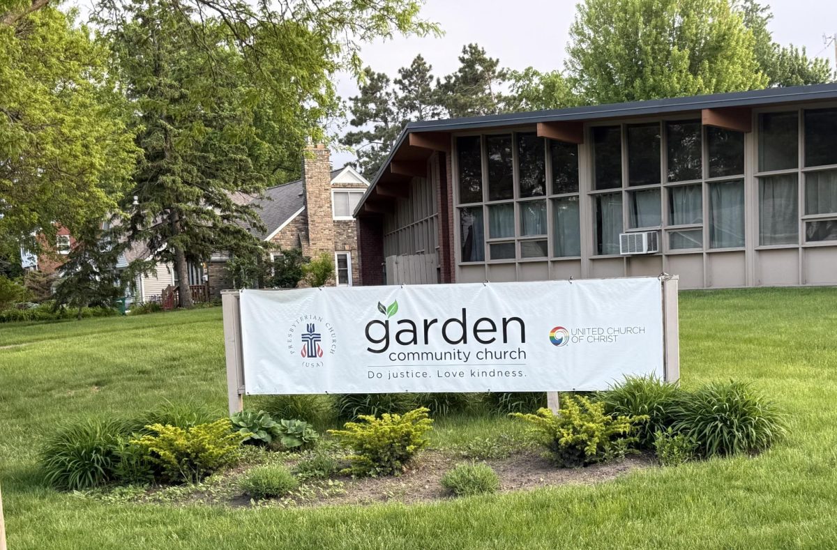 A temporary slipcover-style placard over the old Falcon Heights UCC signpost in front of the church will eventually be replaced with permanent signage. 